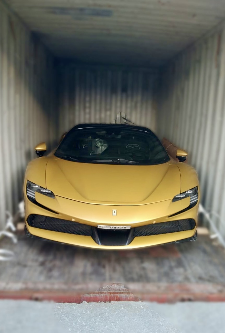 Luxury car being loaded into a container for CPD shipping from Dubai to India